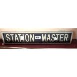 A modern reproduction painted cast iron Station Master sign