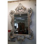 A reproduction limed wood effect Rococo style bevelled oblong wall mirror - overall height 4' 6"