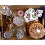 A box of assorted china and glass including four decanters, fishing float, two pink art glass vases,
