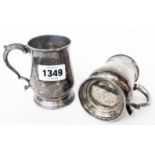 A pair of Georgian silver half pint baluster tankards with cast acanthus scroll handles - London