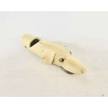 A 19th Century ivory dog's head pattern whistle with glass eyes, in the Dixon manner