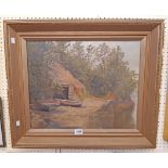 J. Evelyn West: a late Victorian gilt framed oil on canvas, depicting two beached rowing boats and a