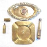 A small quantity of collectable brassware including a Victorian coin set pin tray, lighter, etc.