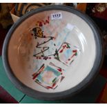 A studio pottery raku bowl with abstract painted decoration