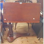 A late Victorian mahogany bed reading table with wrought iron swivel action and brass ratchet rise