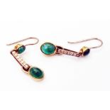 A pair of yellow and white metal drop ear-rings, each set with two cabochon emeralds and row of tiny