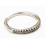 An import marked 950/PT diamond set half eternity ring