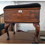 A 20th Century stained mixed wood locker stool with later upholstered seat panel and sewing contents