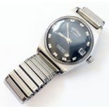 A vintage Citizen wristwatch with black dial and twenty-one jewel automatic movement, on