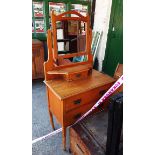 A small dressing table and a matching washstand with marble top - both with woodworm