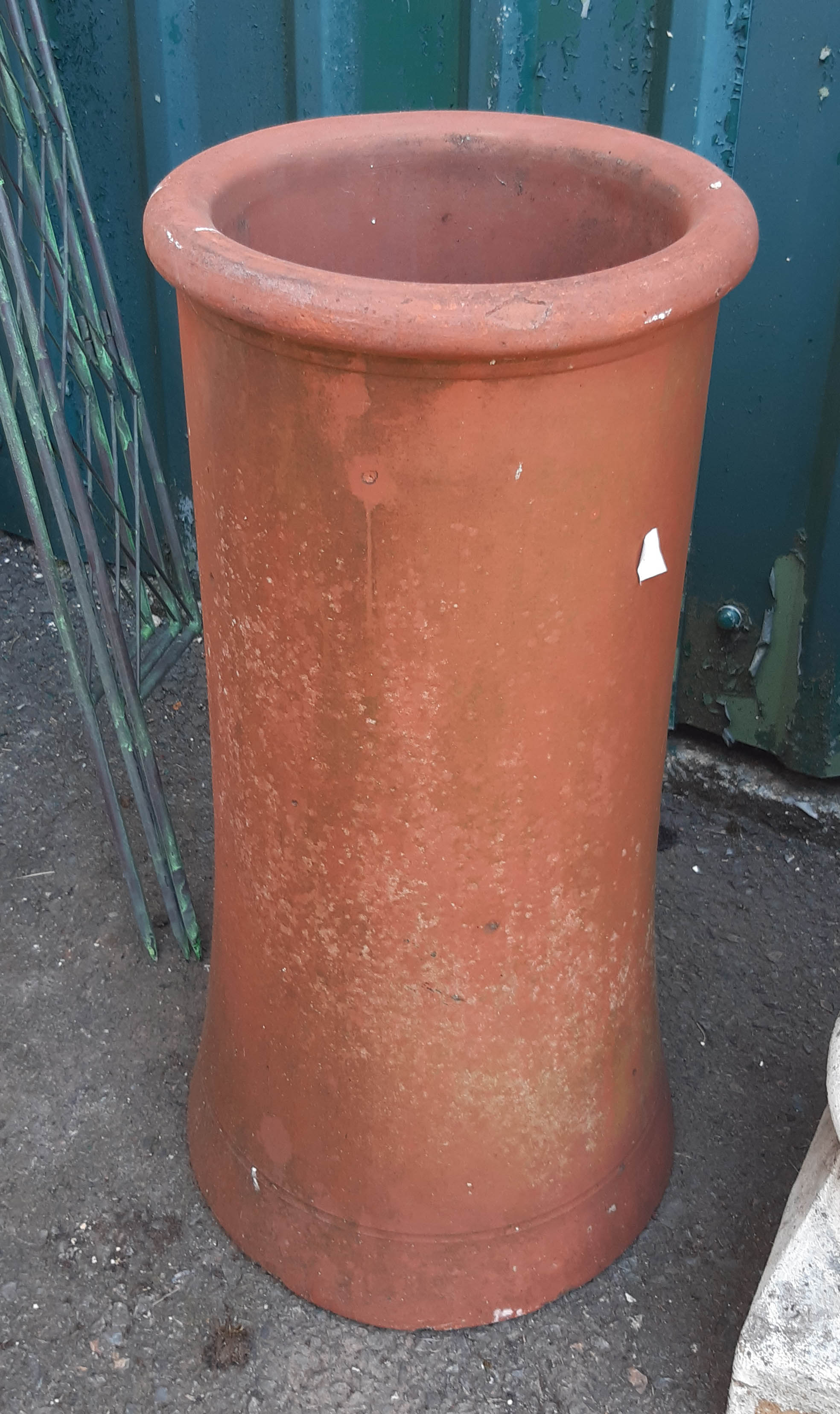 A vintage terracotta chimney pot