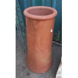 A vintage terracotta chimney pot