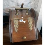 A Victorian stained mixed wood slope fronted coal box with pierced brass strapwork hinges, metal