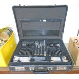 A branded briefcase canteen containing a complete twelve place setting of Bergmann (Solingen) silver