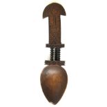 An 18th Century wooden love spoon chip carved with geometric designs, acorn, initials W and F, and