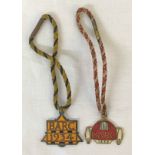 A 1934 Brooklands Automobile Racing Club (BARC) member's badge and a 1939 similar