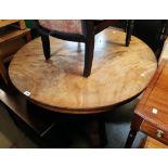 A 3' 6" diameter 19th Century mahogany breakfast table, set on turned pillar and trefoil base with