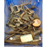 A collection of metalwork tools, stone chisels, etc.