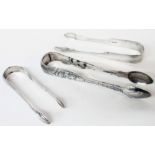 A pair of ornate Irish silver sugar tongs with engraved and embossed Union decoration - CC Dublin