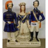 A Victorian Staffordshire figure group, Turkey England France - repaired