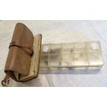 A vintage leather wallet wrap containing a collection of salmon and sea trout flies - sold with a