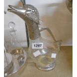 A modern glass wine carafe in the form of a duck with silver plated mounts - base and tail glued