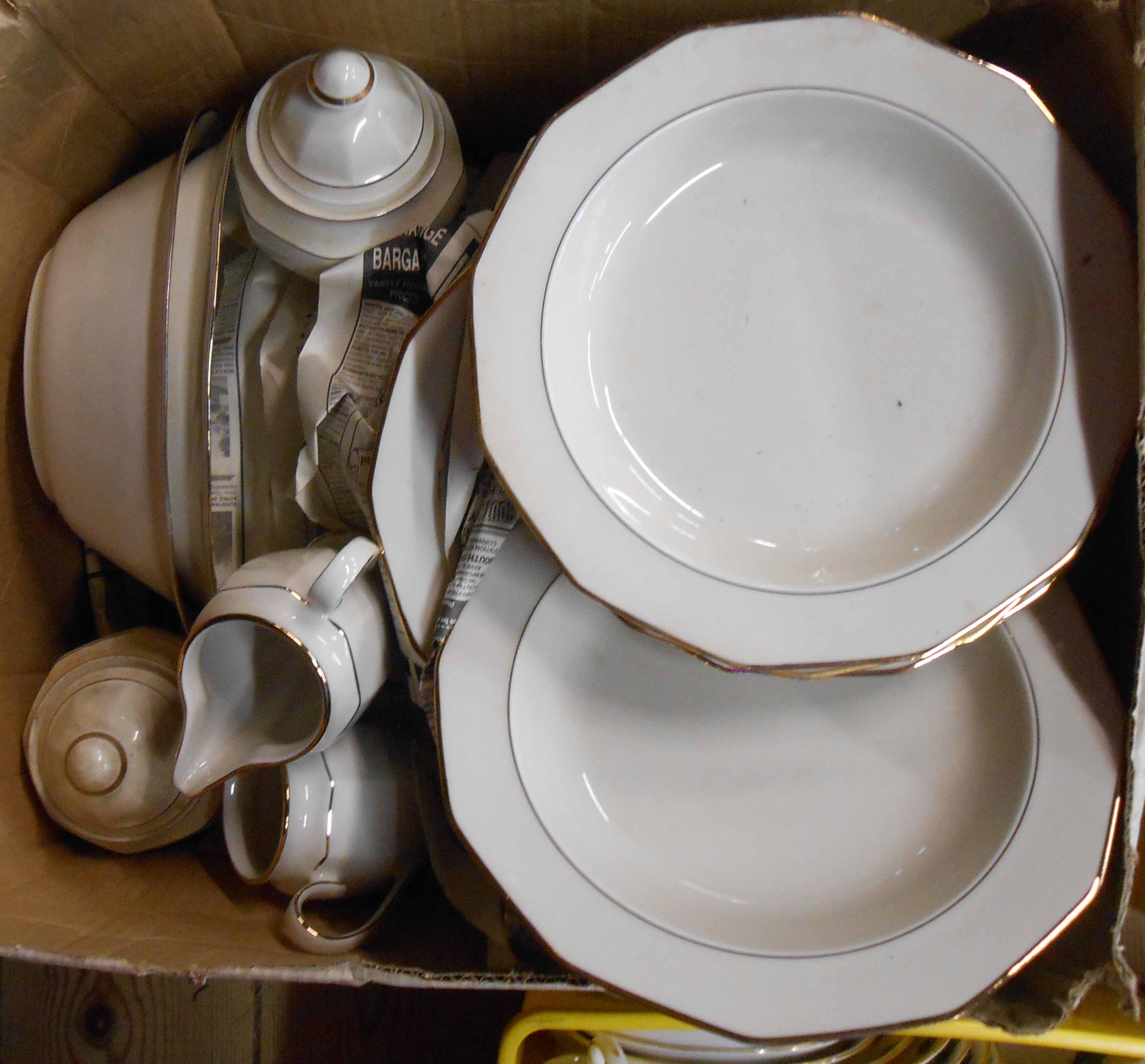 A German Wiesterling part dinner service with gilt banding on ivory ground