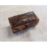 A tortoiseshell trinket box with wirework lattice and stud decoration to lid, and turned bone feet -