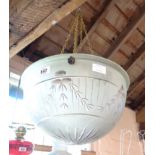 A hanging light with large cut and frosted glass pendant and chains - minor damage to rim