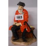 An early Doulton Burslem figure A Chelsea Pensioner HN 689 - one corner of tricorn hat missing and a