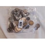 A bag containing assorted coins