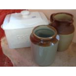 A modern pottery bread crock and two stoneware items