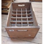 A vintage wooden bottle crate marked for Bray Valley, Clapworthy Mill, North Devon