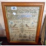 A late Georgian needlework sampler dated 8th November 1797 - in later wooden frame