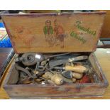 An old Teachers Whisky advertising box containing assorted vintage tools incl oil cans, scrapers,