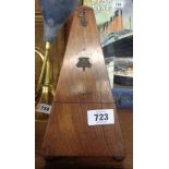 An old rosewood metronome - front cartouche missing