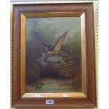 A. Birbeck: an oak framed and gilt slipped oil on panel, depicting a hawk attacking a heron - signed