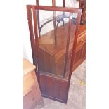 An Edwardian mahogany framed triple draught screen with part glazed panels and reeding to lower