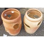 Two terracotta strawberry pots