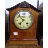 An early 20th Century mahogany and strung cased mantel clock with eight day gong striking movement -