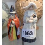 Two Royal Worcester candle extinguishers, witch and nun