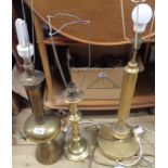 Three brass table lamps