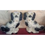 A pair of 19th Century Staffordshire spaniels