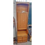 A 20 1/2 " Nathan Furniture teak effect drinks cabinet with shelf, locking door, recess and panelled