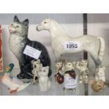 A quantity of Beswick and other animal figurines including Welsh Cob, four members of a cat band,