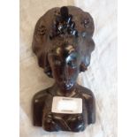 An Asian hardwood female bust