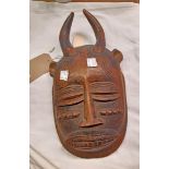 A Polynesian tribal horned mask from the estate sale of Robert Lenkiewicz sale of 2008