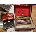 A workbox carcass, two collectable tins and a leather trinket box