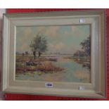 A framed 20th Century oil on canvas, depicting a waterway inlet with rowing boats and cottage -