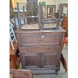 A 3' 1" early 20th Century oak cabinet - sold with two standard chairs - various condition
